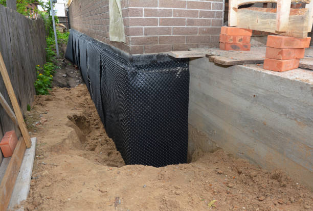 Happy homeowners after waterproofing job in Morrisville